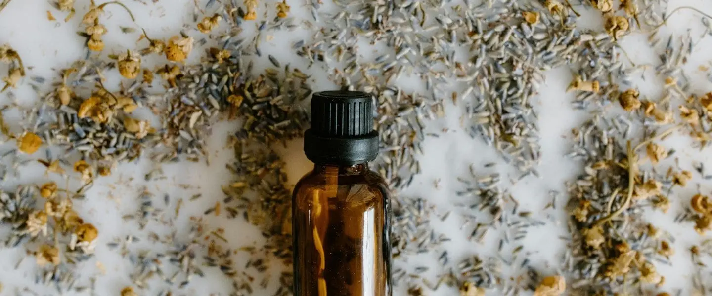 Banner image of a bottle of lavender essential oil