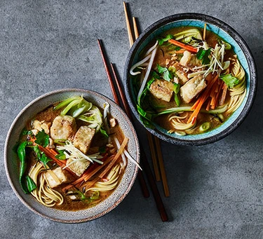 Two bowls of vegan ramen soup